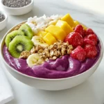 What is in a Tropical Smoothie acai bowl?