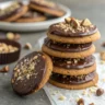 Stack of chocolate hazelnut crunch cookies with chocolate dip