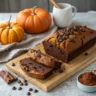 Sliced chocolate pumpkin bread loaf with chocolate chips