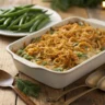 Baked green bean casserole topped with crispy fried onions