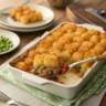 Crispy golden tater tot casserole baked with beef, vegetables, and cheese.
