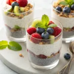 Layered chia seed pudding parfaits with fruit and yogurt