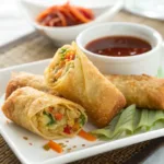 Crispy Vegetable Egg Rolls served with dipping sauce