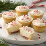 Peppermint Cheesecake Bites on a plate with crushed peppermint