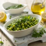 Bright green peas with fresh herbs and lemon zest