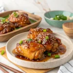 Juicy honey garlic chicken thighs glazed with caramelized sauce.