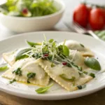 Colorful spring vegetable ravioli drizzled with creamy dressing and garnished with fresh herbs.