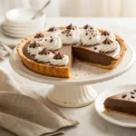 French silk pie with whipped cream and chocolate shavings