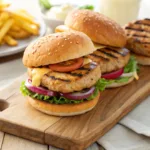 Grilled chicken burger with lettuce, tomato, and melted cheese