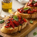 Bruschetta with roasted red peppers, basil, and toasted bread