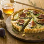 Fig and blue cheese tart with honey drizzle and flaky pastry crust