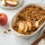 Warm apple pear crisp with tender fruit, cinnamon filling, and a golden buttery oat crumble topping.